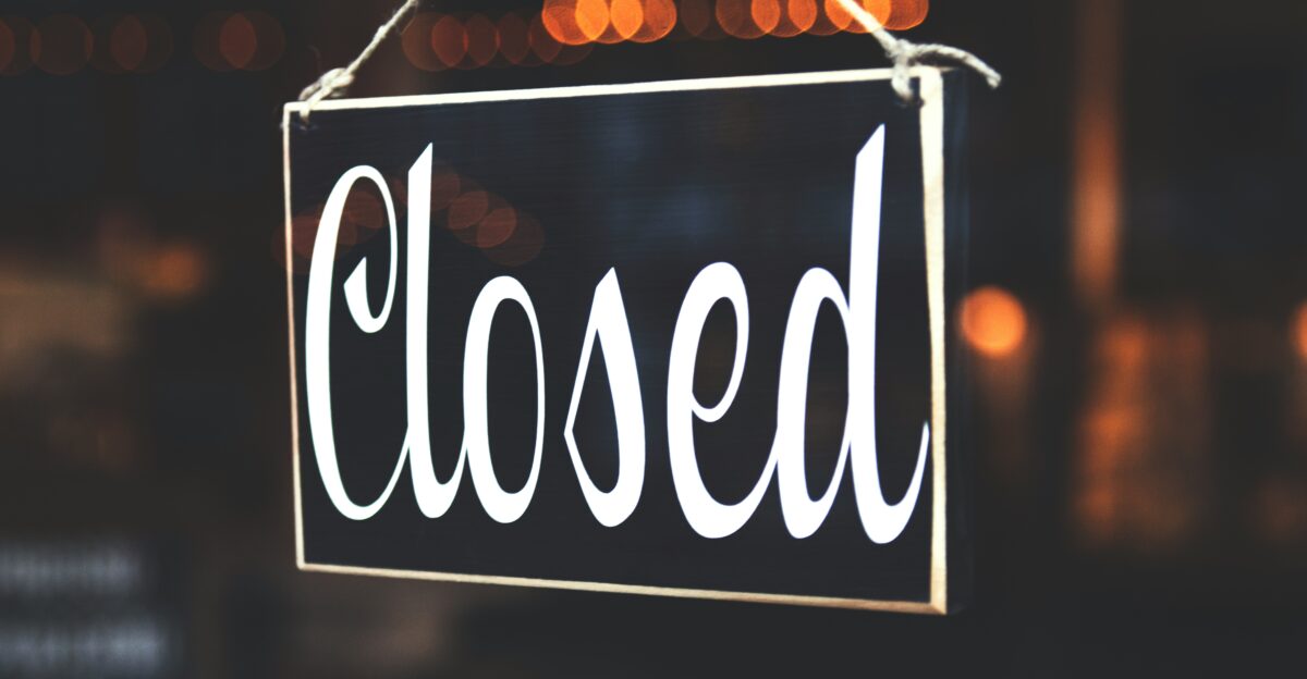bokeh photography of closed signage