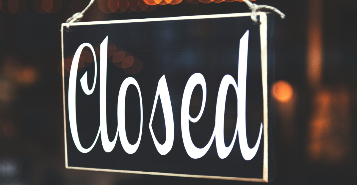 bokeh photography of closed signage