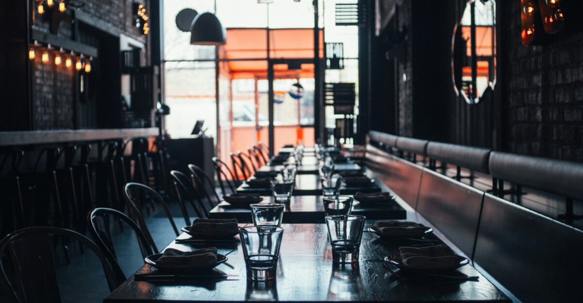 clear glass cup on brown wooden table