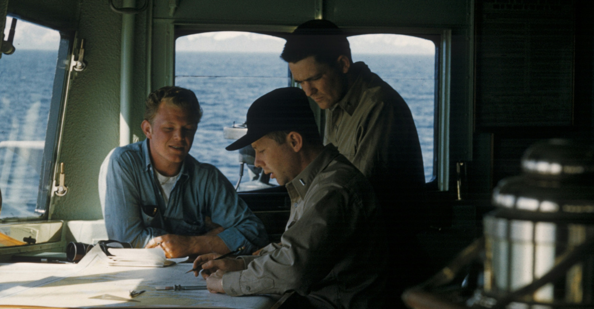 three men navigating