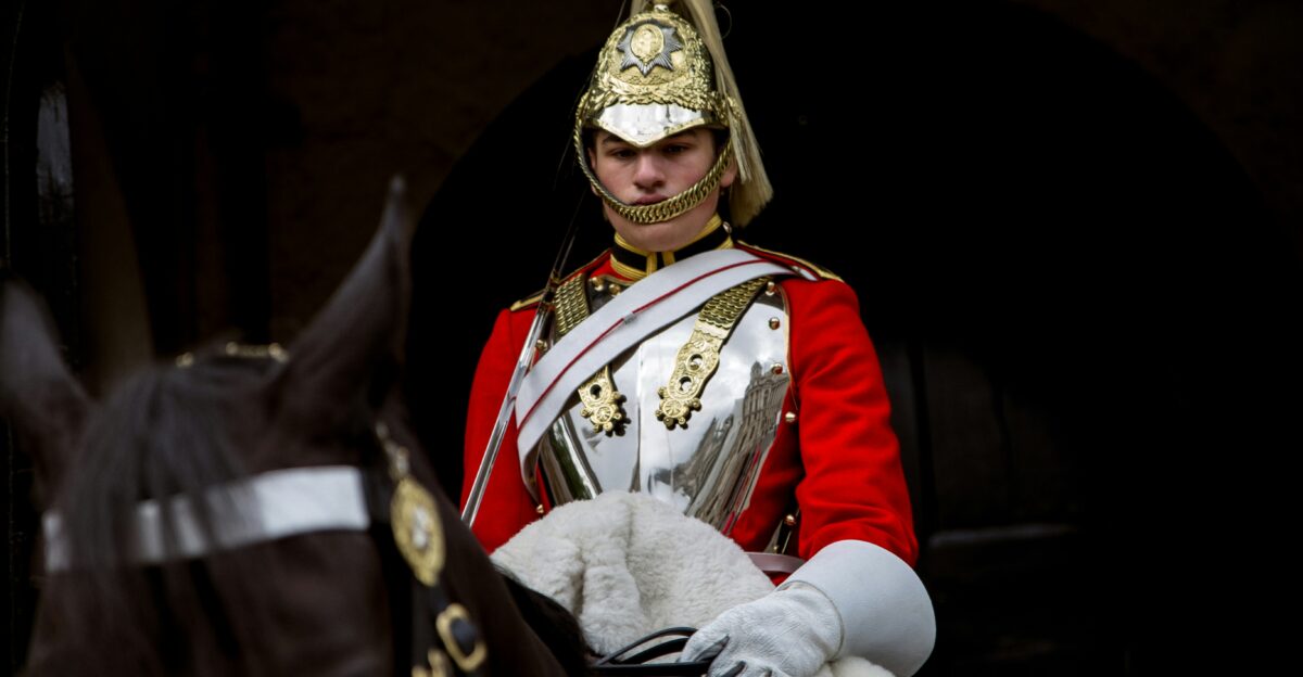 close-up of a mounted Knight in full armour riding horse
