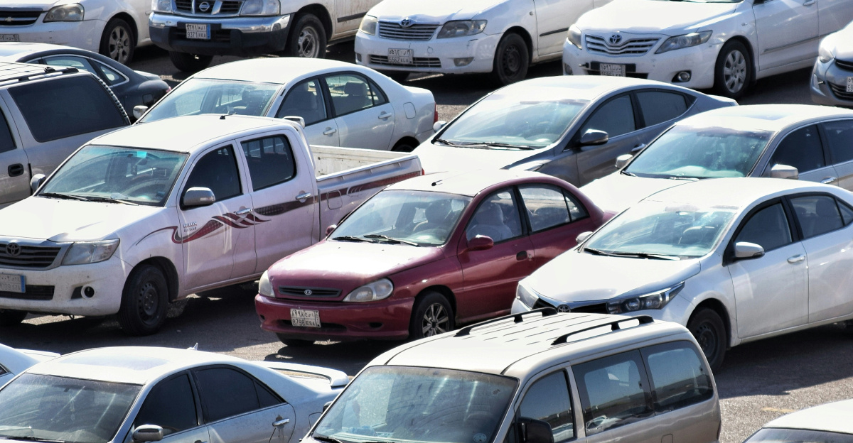 white sedan on the road