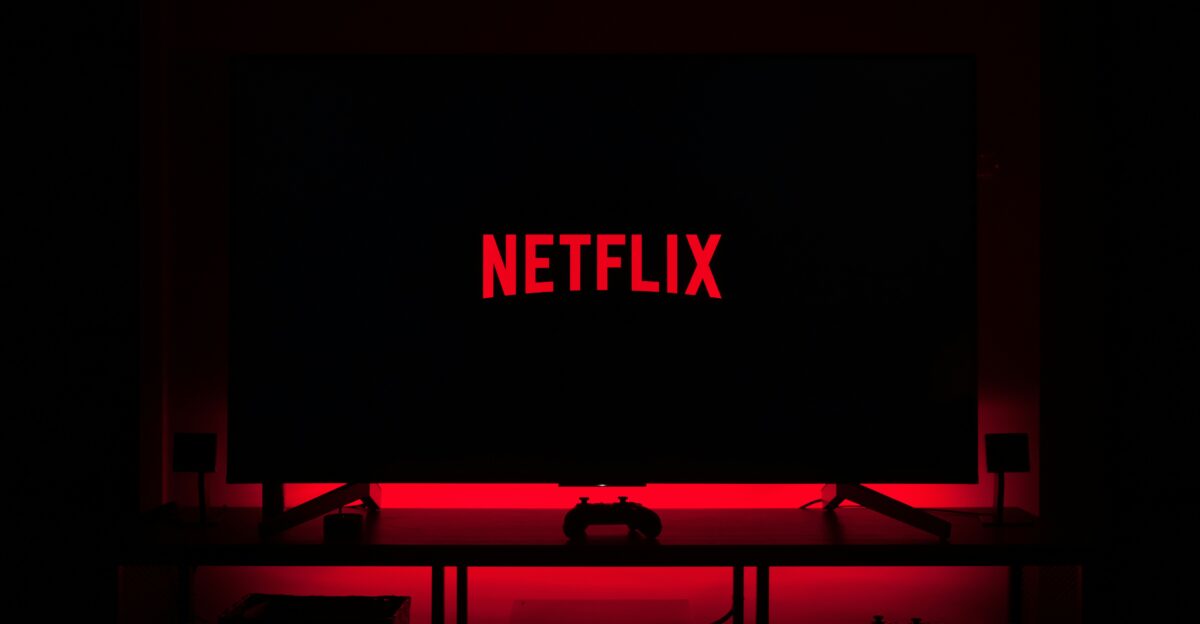 flat screen television displaying Netflix logo