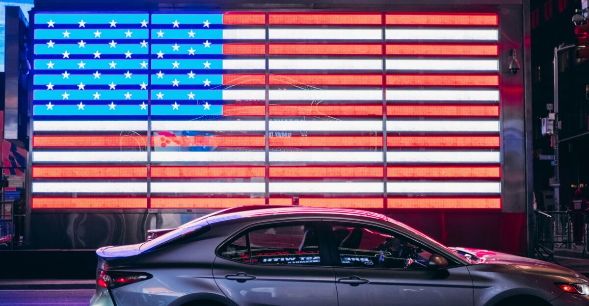 shallow focus photo of gray sedan