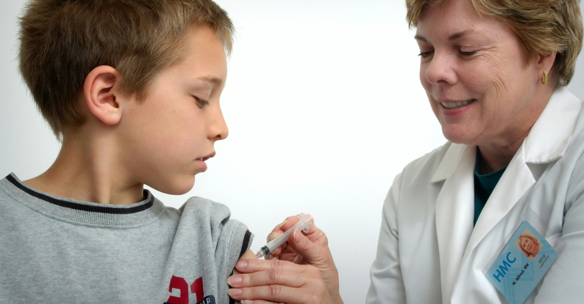woman inject boy on arm