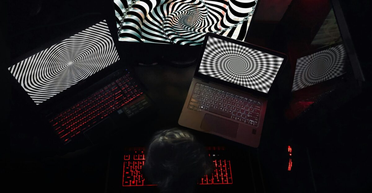 woman in white shirt sitting on chair