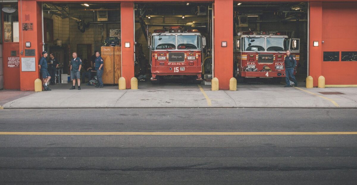 red double decker bus on road during daytime