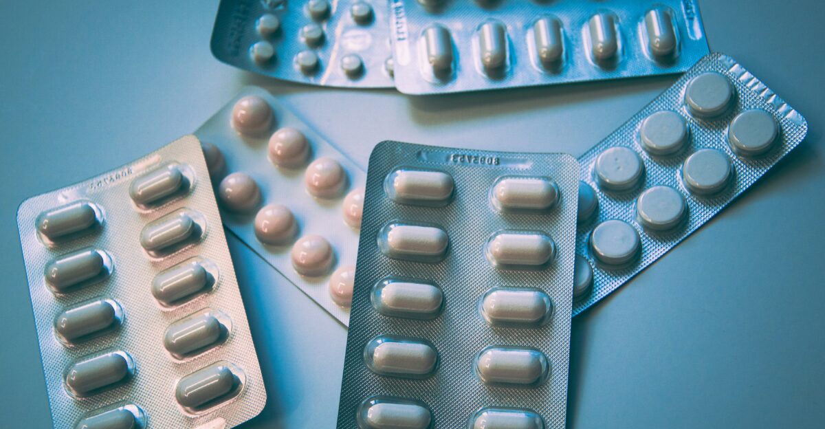 white and blue medication pill blister pack