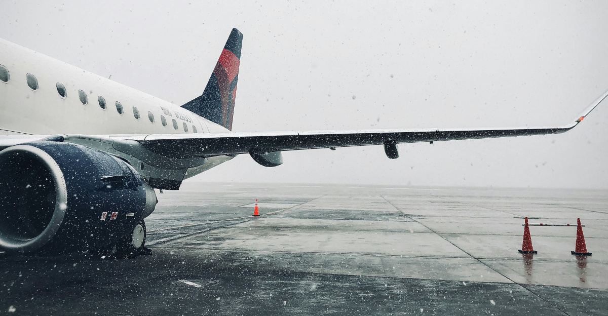 white passenger plane on airport during daytime