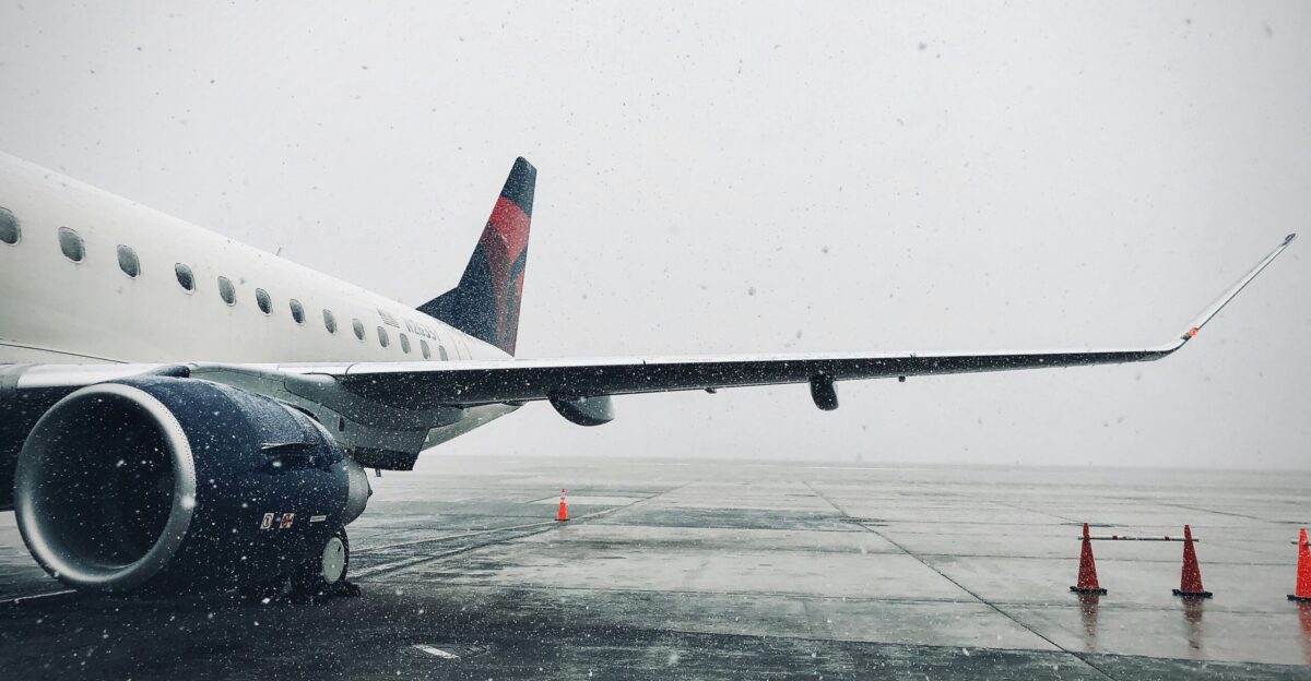 white passenger plane on airport during daytime