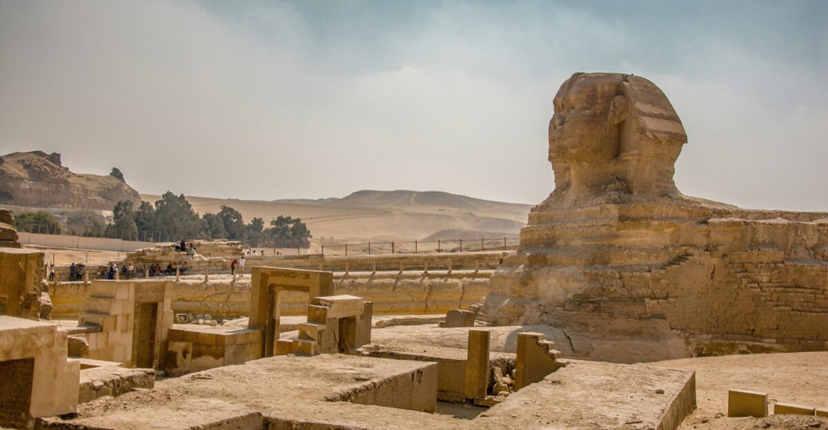 brown rock formation under white sky during daytime