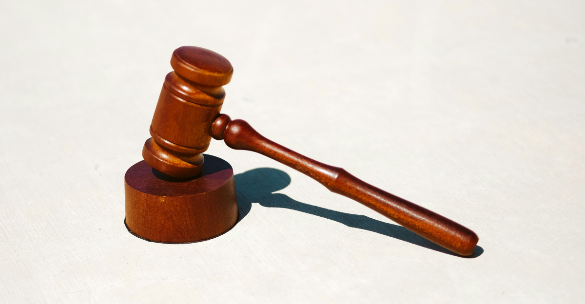 brown wooden tool on white surface