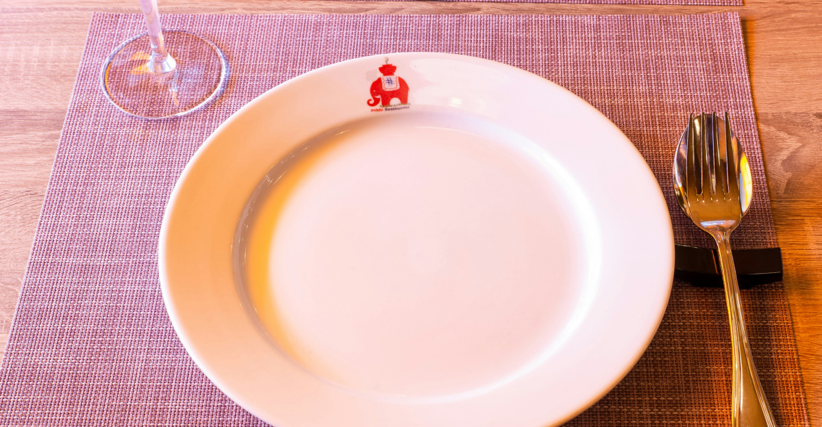 white ceramic plate on table