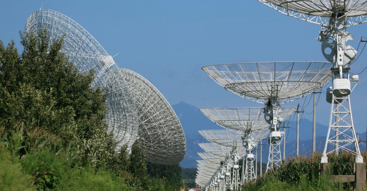 white ferris wheel under blue sky during daytime