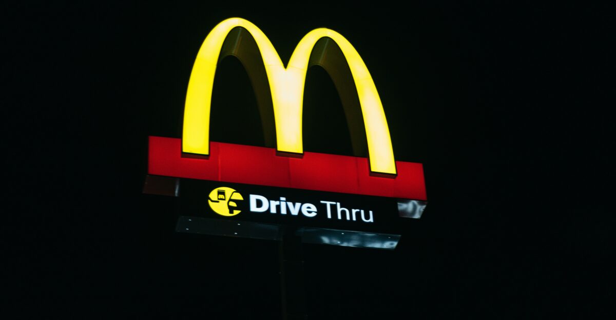 red and yellow love neon light signage