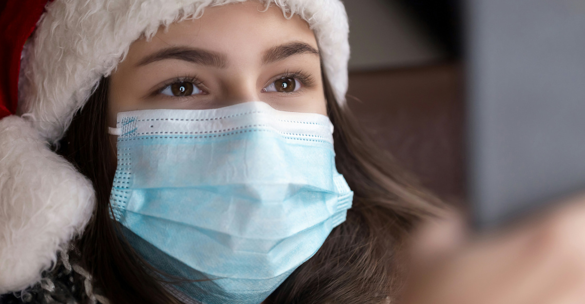 woman in white and red santa hat