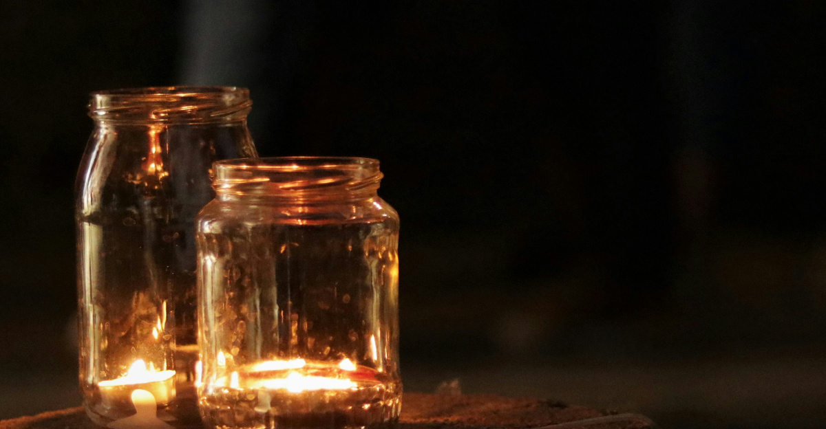 clear glass bottles on brown wooden table