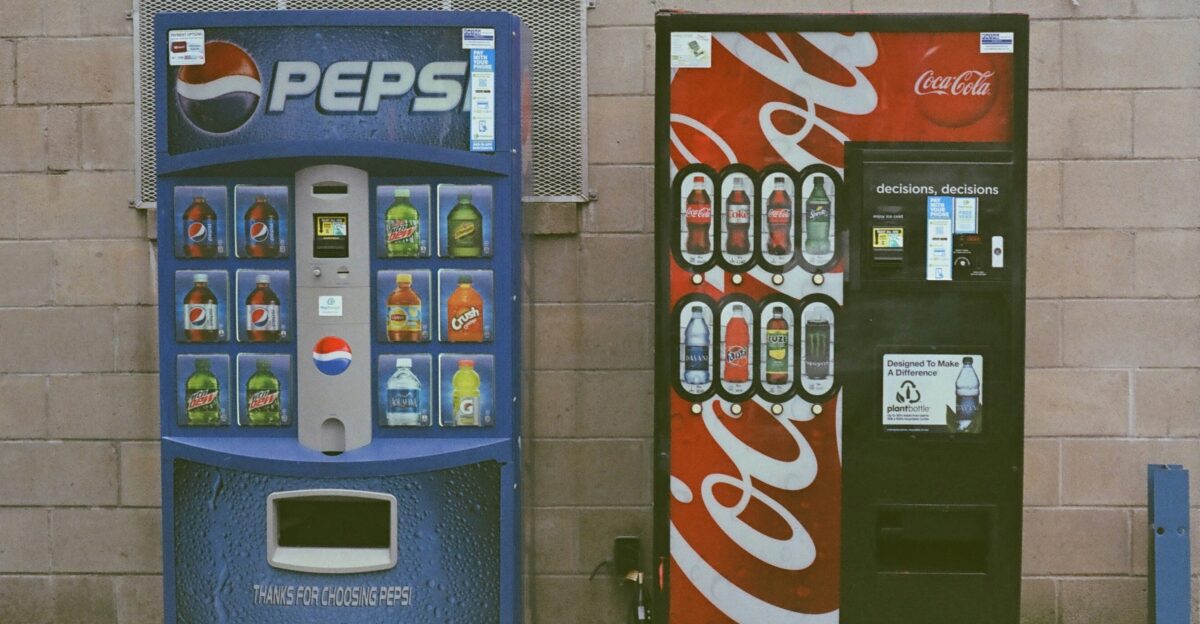 blue and white pepsi cola vending machine