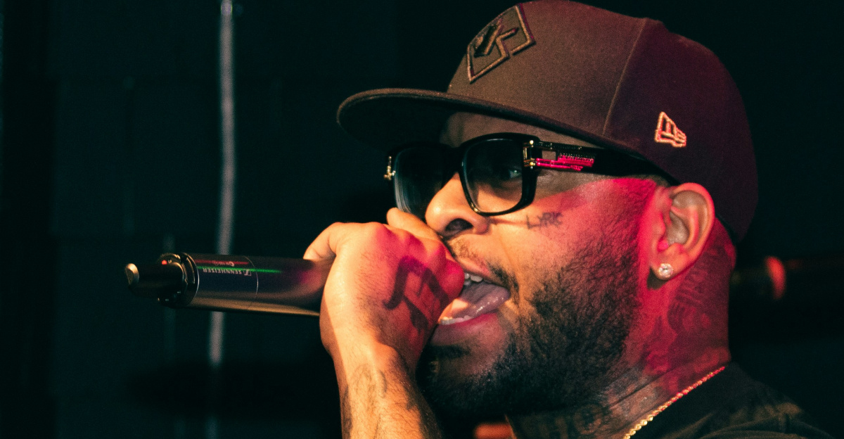 man in black crew neck t-shirt wearing black sunglasses