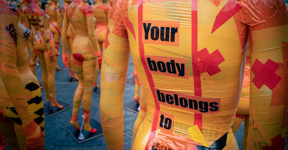 people in yellow and pink t-shirts