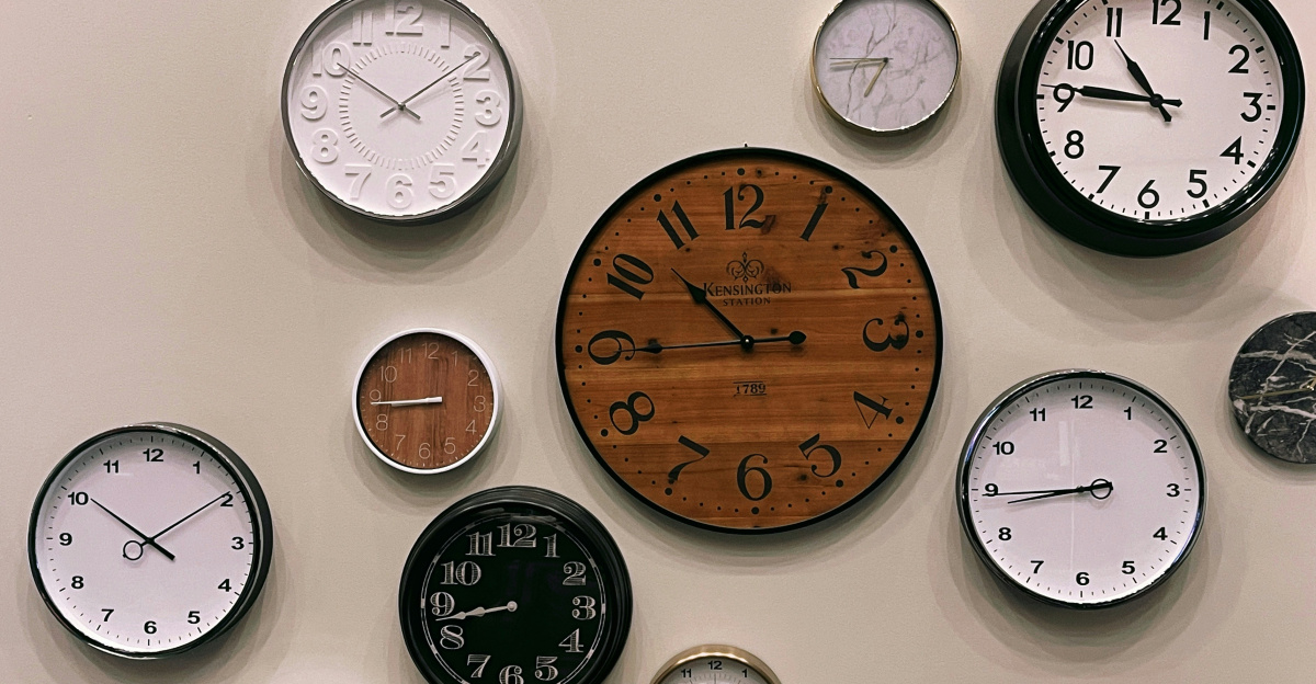 white and brown analog wall clock at 10 00