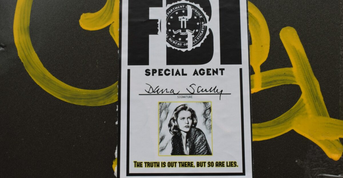 black and white book on yellow and black textile