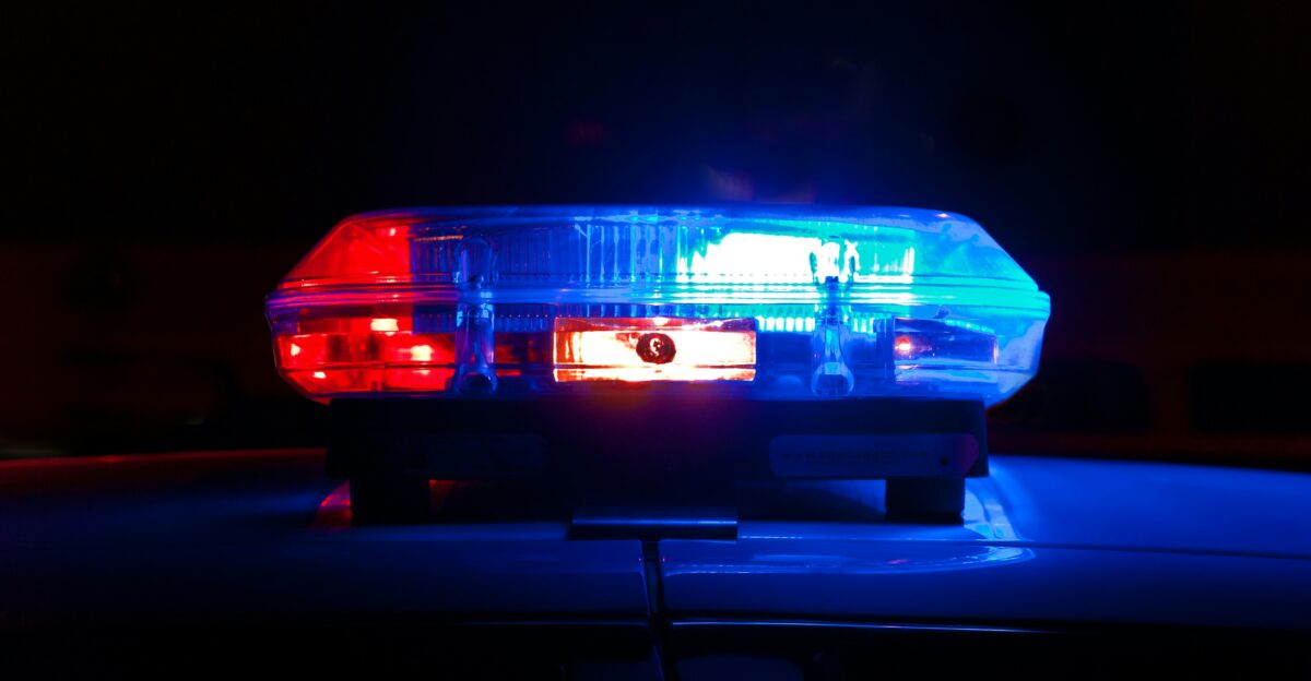 blue bmw car in a dark room