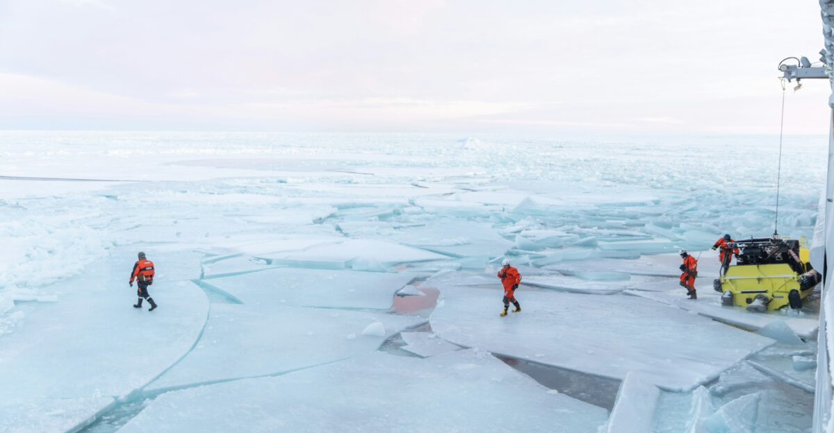 people in snow covered field during daytime