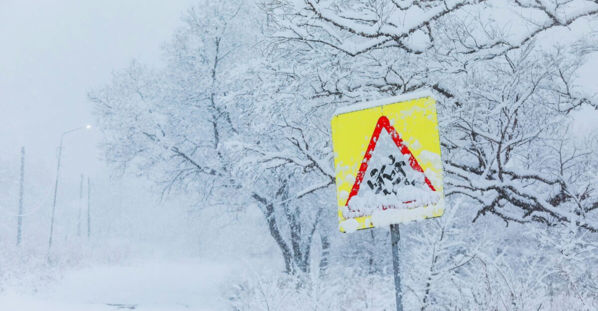 red and white arrow sign