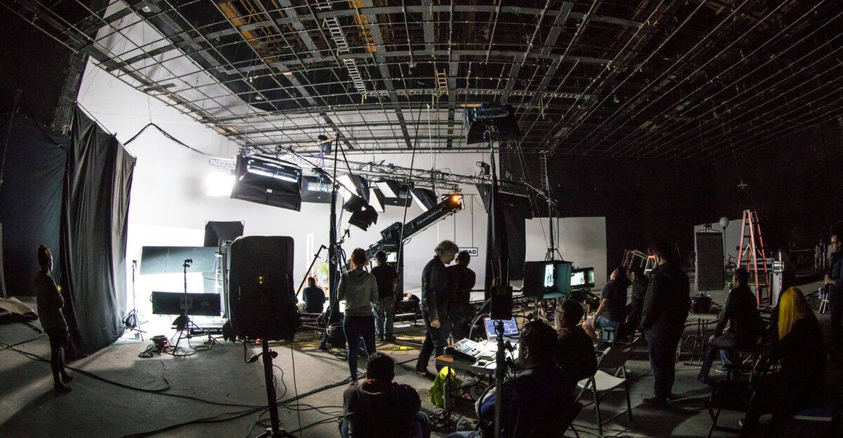 band playing on stage during daytime