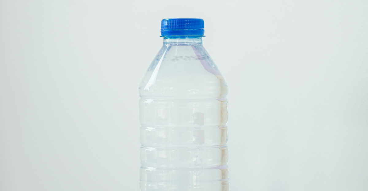 clear plastic bottle on white table