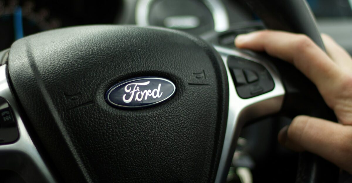 black nissan car steering wheel