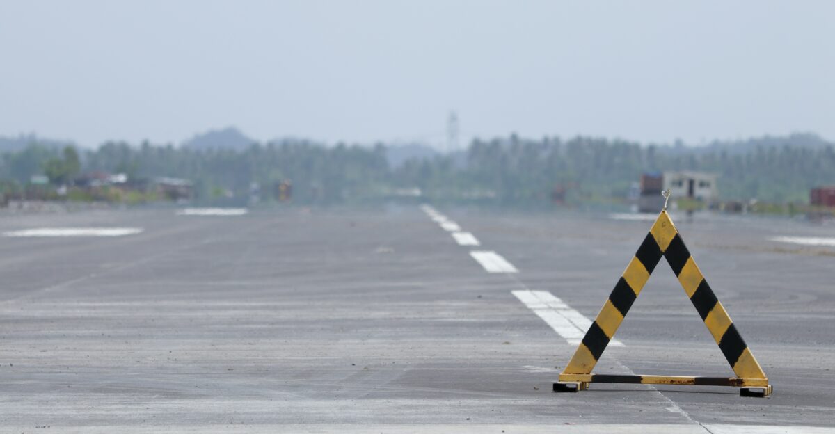 yellow and black road sign