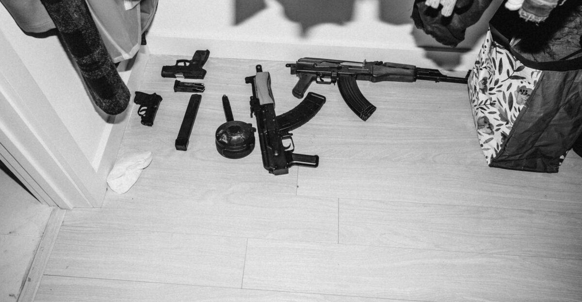 black assault rifle on floor