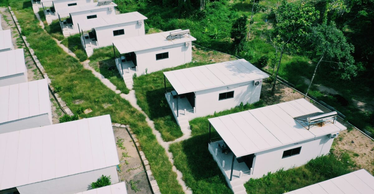 white concrete building near green trees during daytime