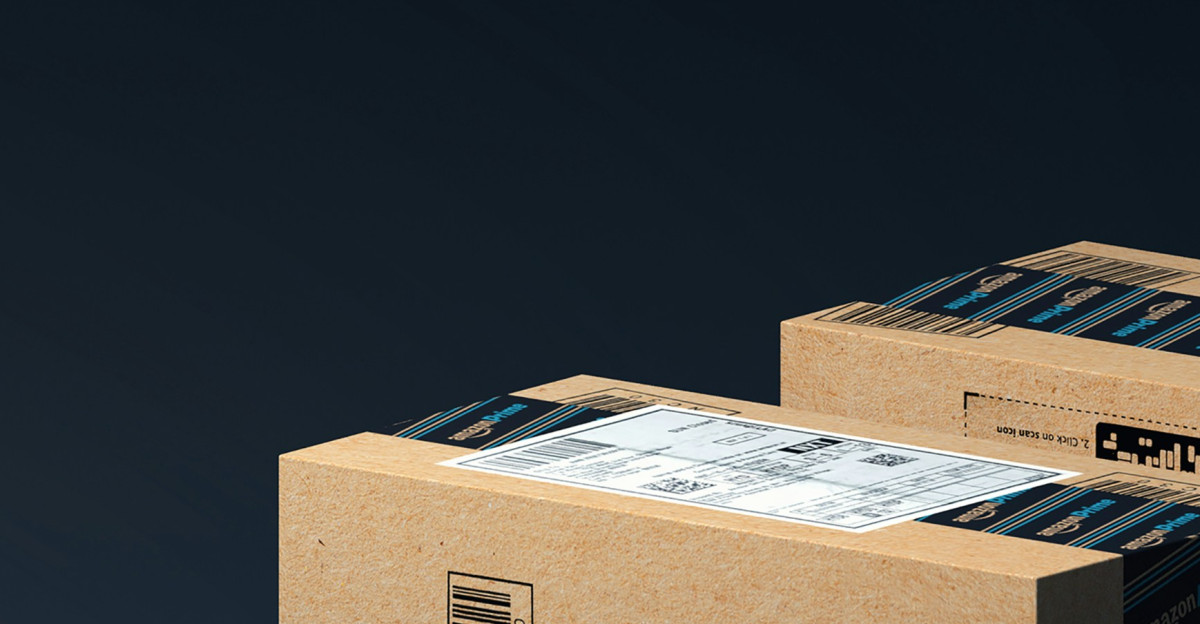 two boxes of amazon are stacked on top of each other