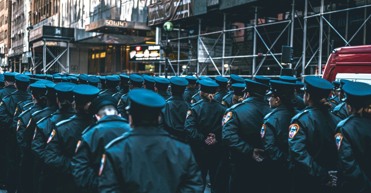 a group of police officers standing in a line