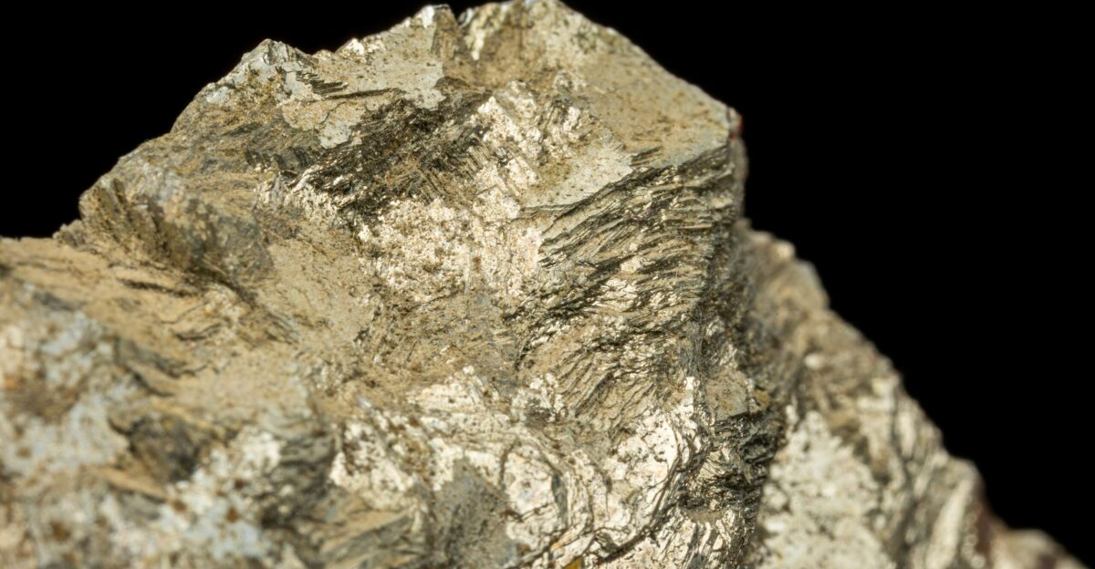 a close up of a rock with a black background