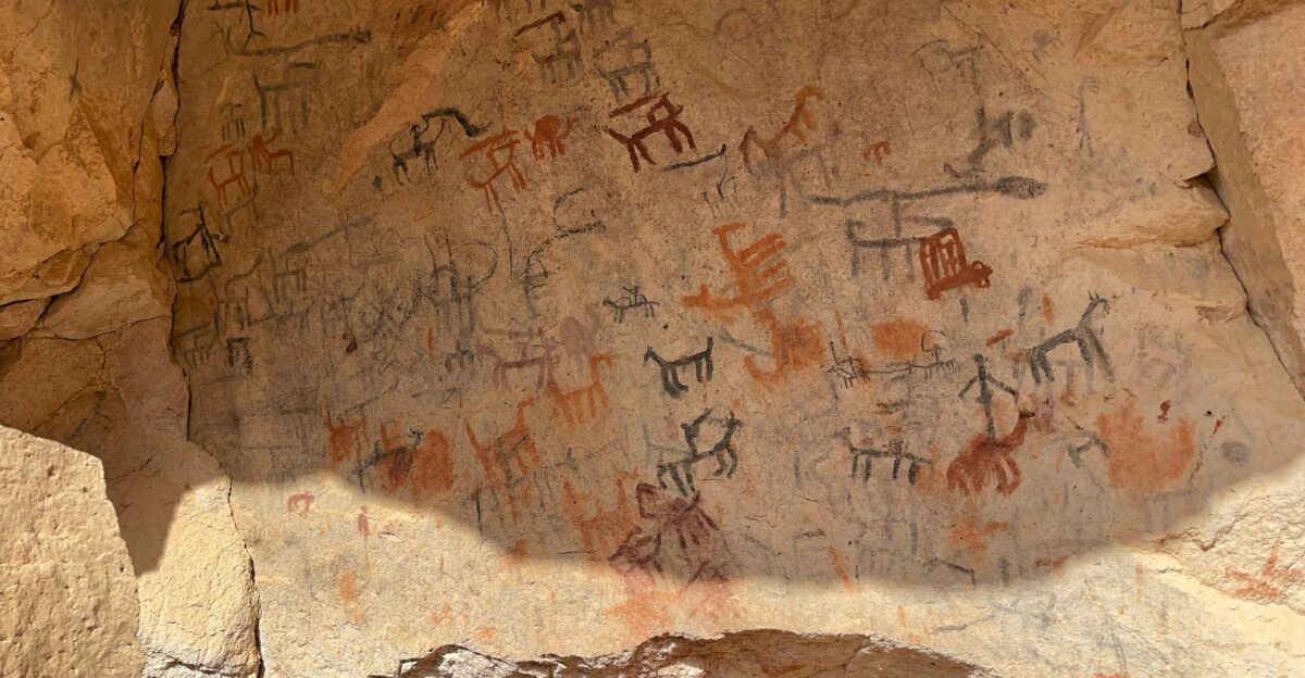 a large rock with some writing on it