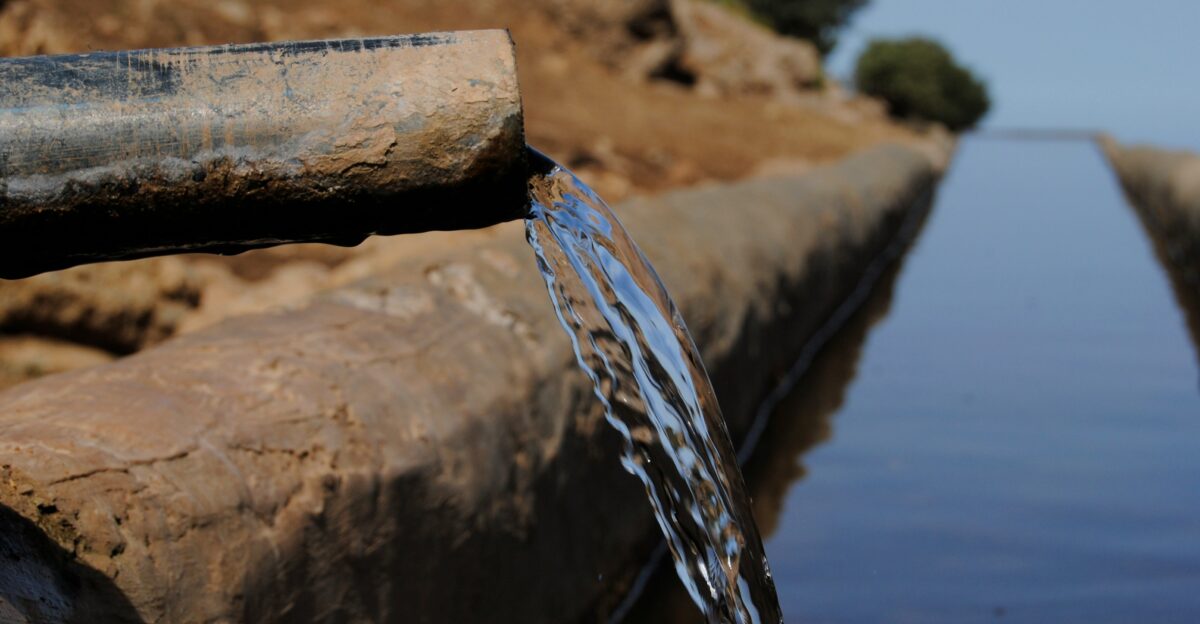 a pipe that has water coming out of it