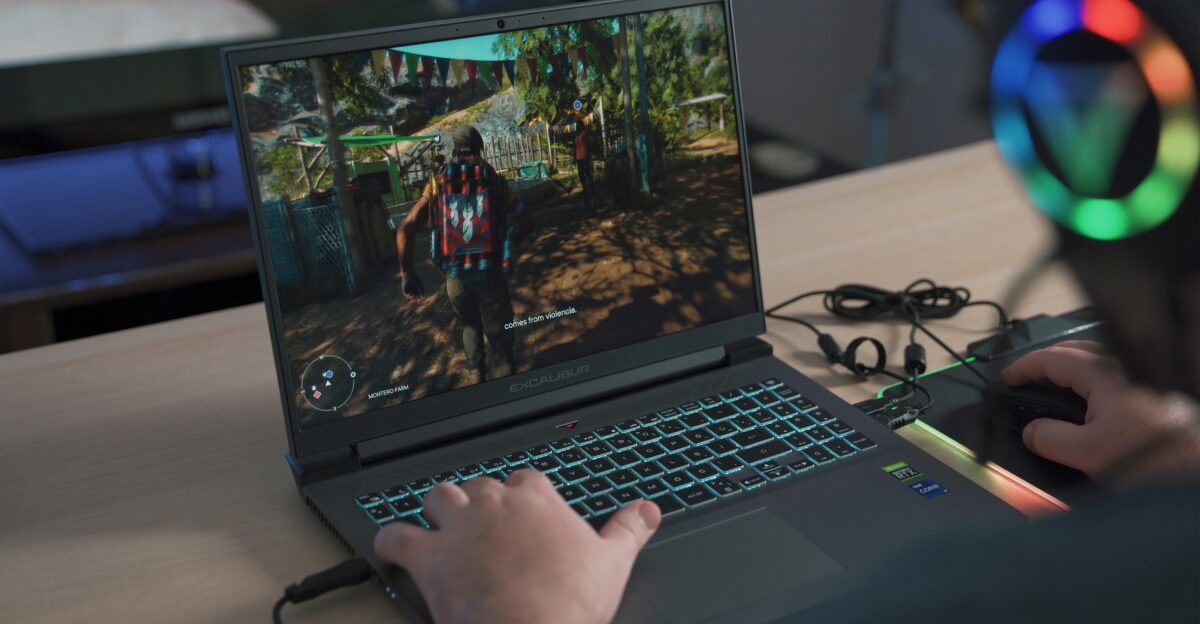 a person playing a video game on a laptop