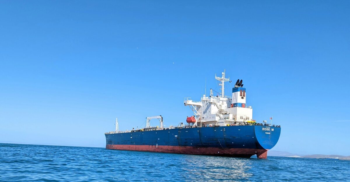 a large boat floating on top of a body of water