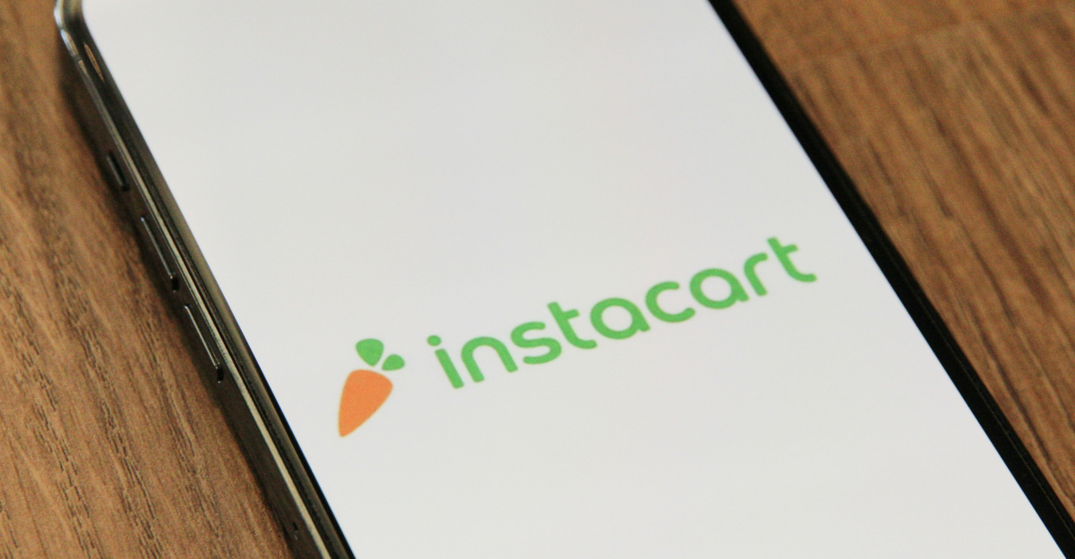 a phone with the instocart logo on it