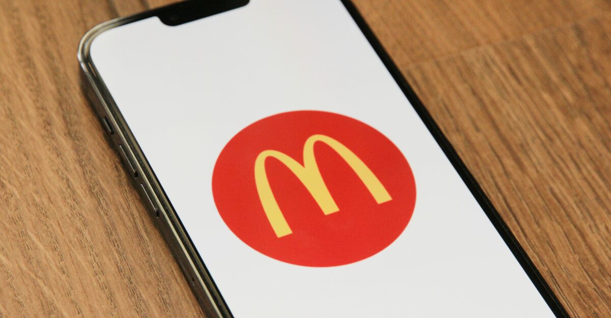 a cell phone with a mcdonald s logo on it