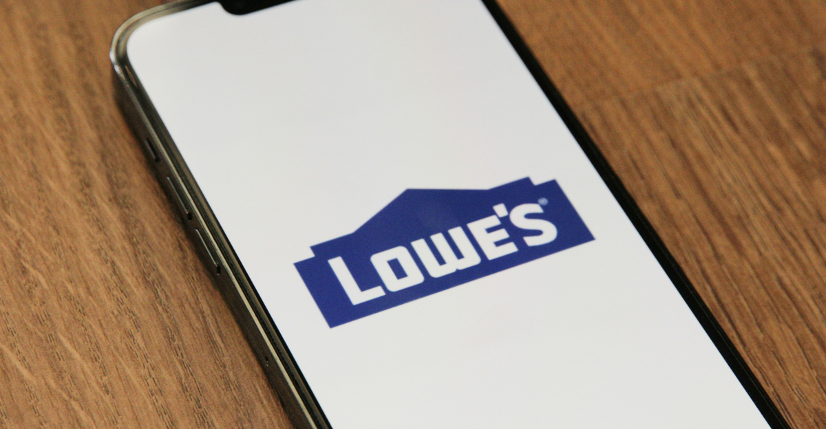 a phone with a logo on it sitting on a table