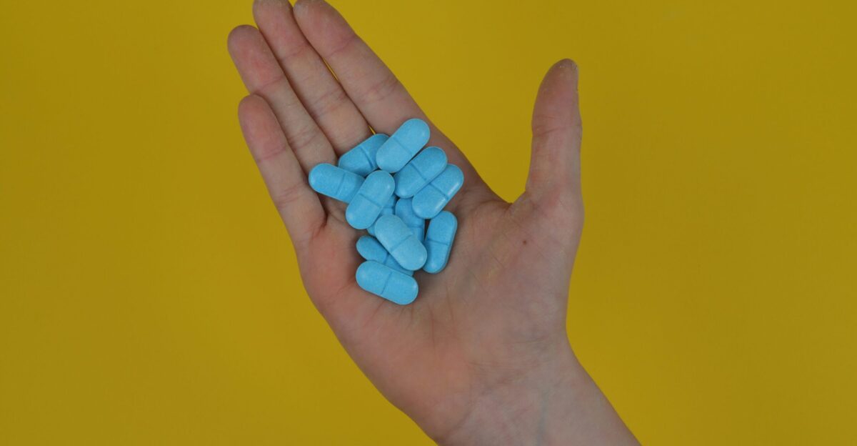 a hand with blue nails