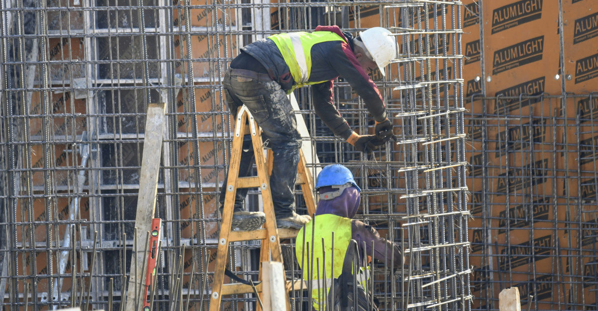 a group of men working on a construction site