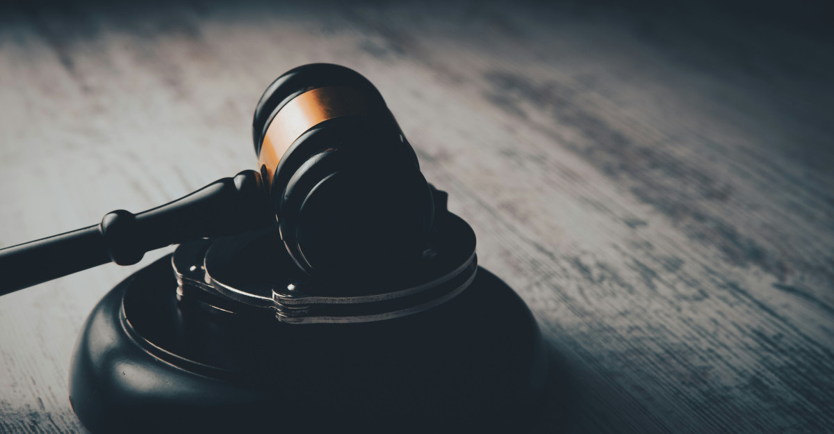 a judge s gaven on a wooden table