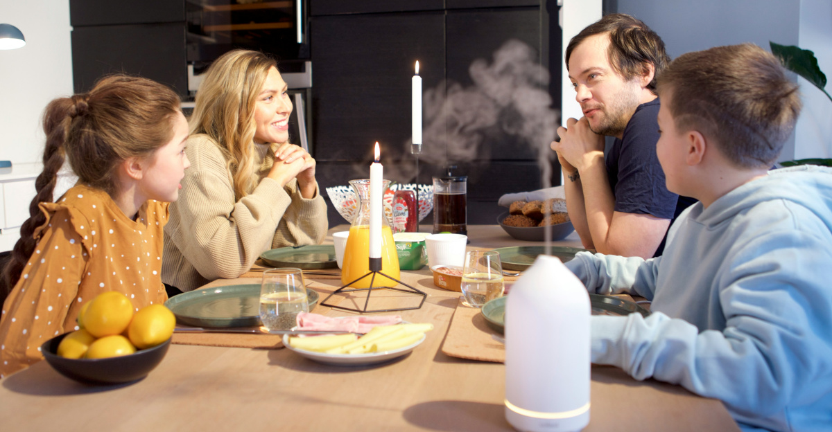 a group of people sitting around a table