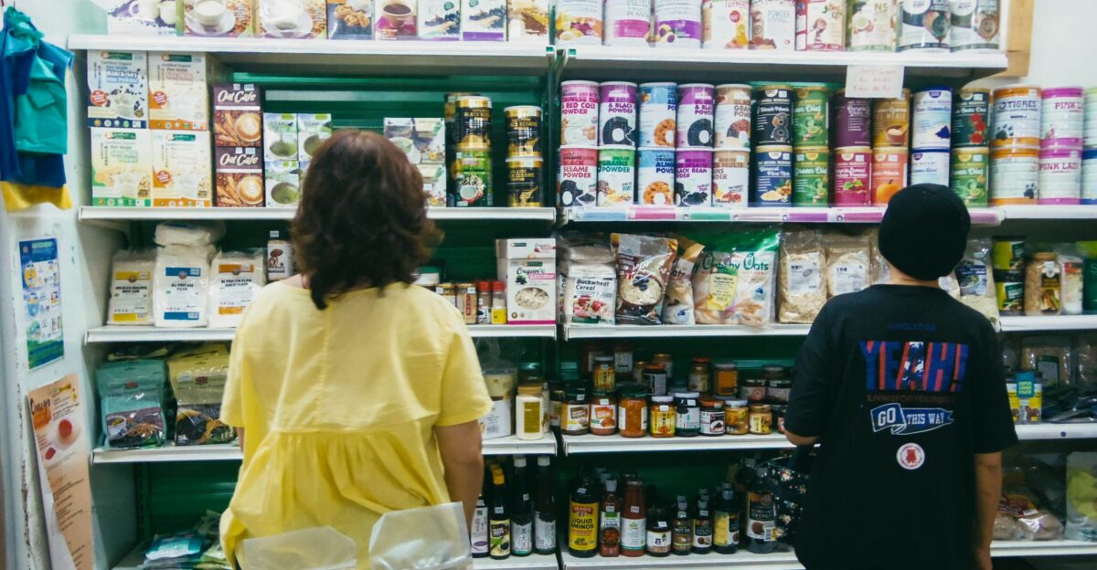 a couple of people in a store